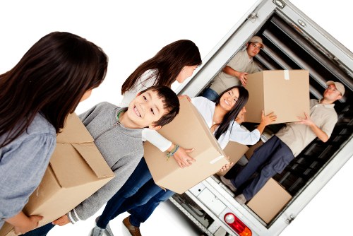 Professional movers handling a family home relocation