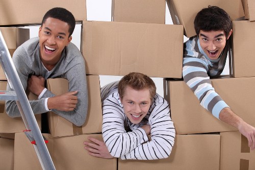 Loading furniture into a removals van for a house move