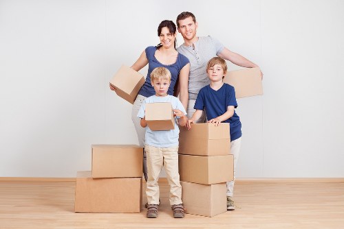 Furniture being moved carefully during a local removal job