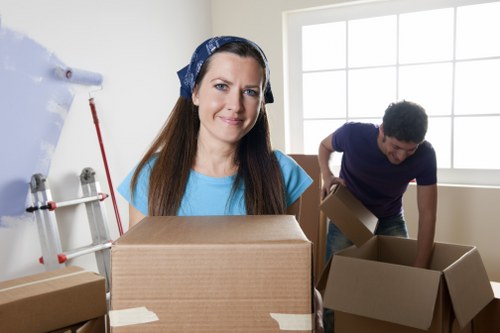 New homeowners settling into a property after a removals service