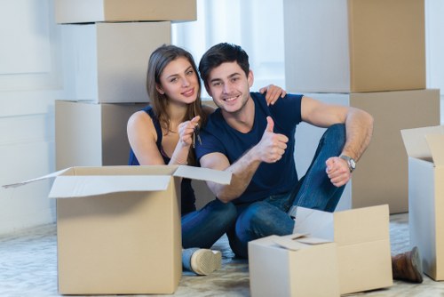 Packed moving boxes and furniture ready for house removals in Removals