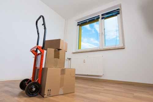 Household boxes and furniture arranged for a smooth move in Removals