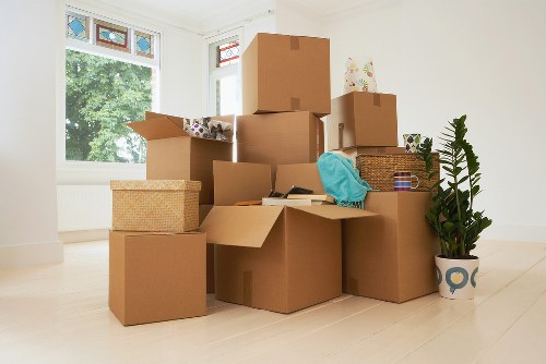 Unpacking boxes in a new home after a local removal service