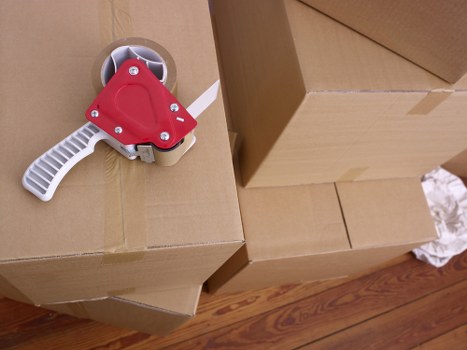 A moving crew managing a smooth home removal with protective wrapping