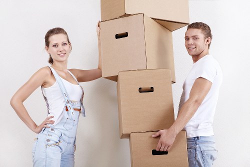 Local removals team handling office furniture and equipment
