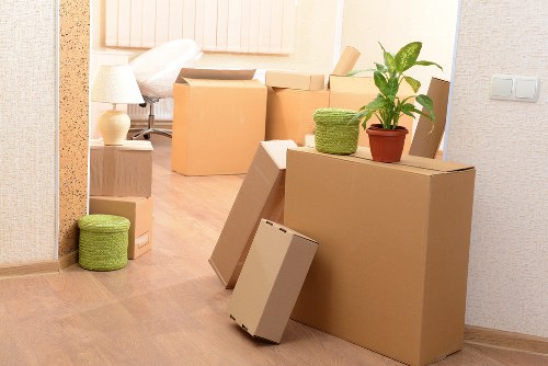 Small business office items being transported by a man with van service