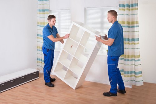 Local removals crew navigating tight access at a property