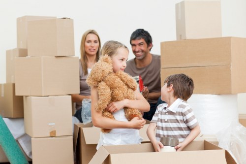 Loading furniture and boxes into a removals van for a nearby property move
